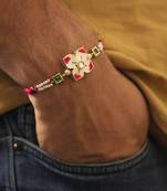 Floral kundan pearl designer rakhi with roli chawal capsules