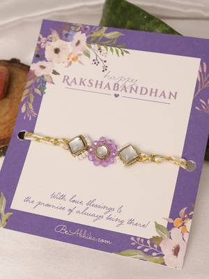 Purple floral pearl stone rakhi with roli chawal capsules 2
