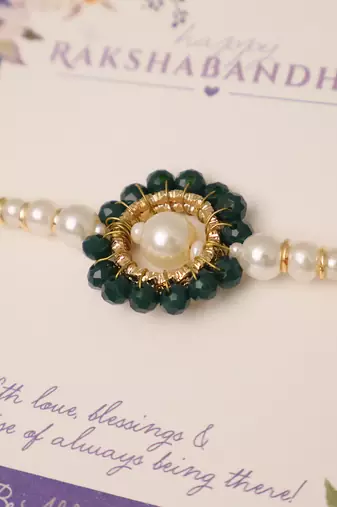 Green pearl floral beaded rakhi with roli chawal capsules