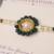 Green pearl floral beaded rakhi with roli chawal capsules