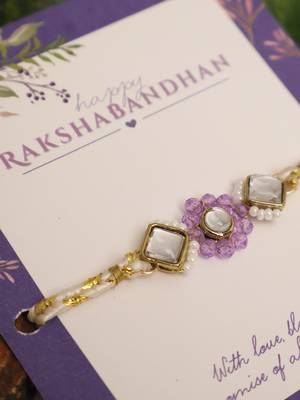 Purple floral pearl stone rakhi with roli chawal capsules 3