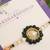 Green pearl floral beaded rakhi with roli chawal capsules