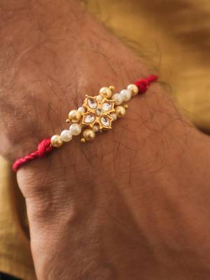 Kundan floral pearl red rakhi with roli chawal capsules 3