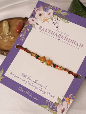 Amber diamond beaded thread rakhi with roli chawal capsules 2