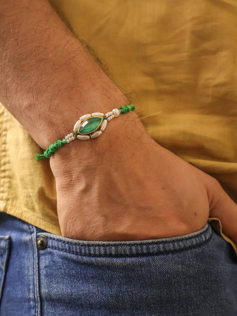 Emerald pearl marquise designer rakhi with roli chawal capsules
