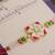 Floral kundan pearl designer rakhi with roli chawal capsules