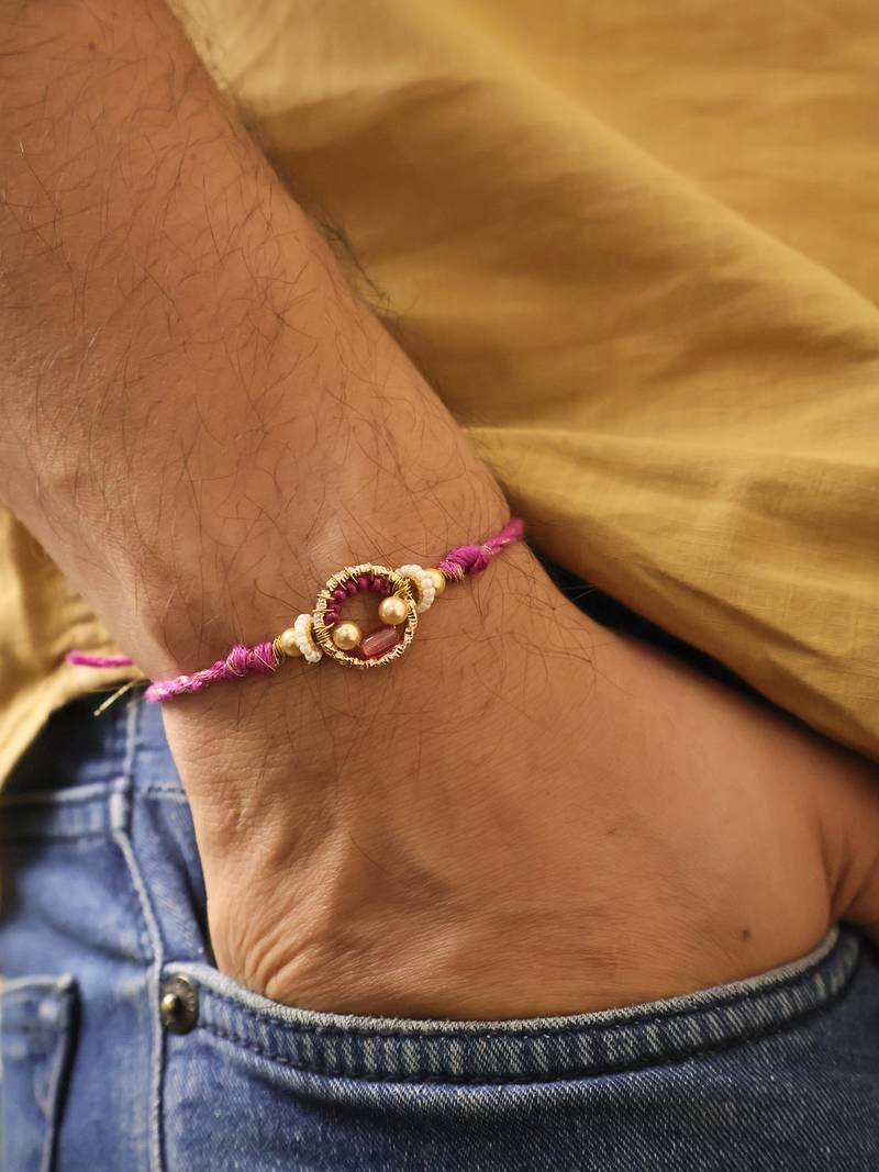 Purple crystal halo beaded rakhi with roli chawal capsules