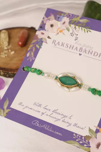 Emerald pearl marquise designer rakhi with roli chawal capsules