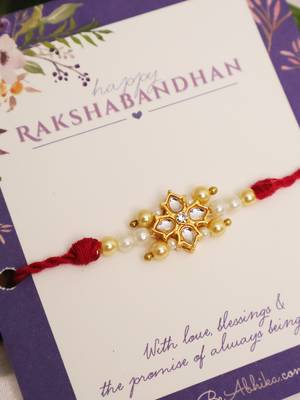 Kundan floral pearl red rakhi with roli chawal capsules 5