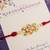 Kundan floral pearl red rakhi with roli chawal capsules