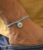 Blue evil eye protection rakhi with roli chawal capsules