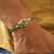 Emerald pearl marquise designer rakhi with roli chawal capsules