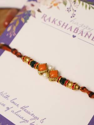 Amber diamond beaded thread rakhi with roli chawal capsules 4
