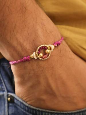 Purple crystal halo beaded rakhi with roli chawal capsules 3