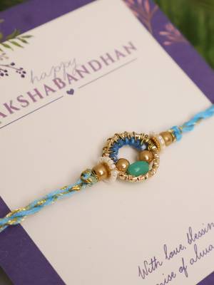 Sky blue crystal halo rakhi with roli chawal capsules 4