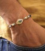 Blue peacock pearl charm rakhi with roli chawal capsules