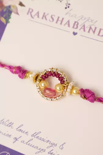 Purple crystal halo beaded rakhi with roli chawal capsules