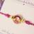 Purple crystal halo beaded rakhi with roli chawal capsules