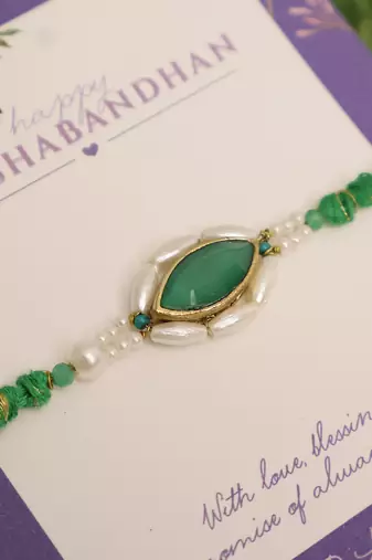Emerald pearl marquise designer rakhi with roli chawal capsules