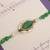 Emerald pearl marquise designer rakhi with roli chawal capsules