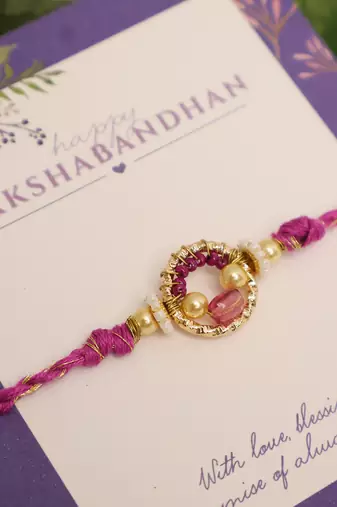 Purple crystal halo beaded rakhi with roli chawal capsules