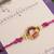 Purple crystal halo beaded rakhi with roli chawal capsules