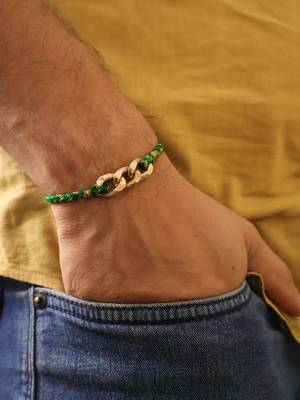 Golden chain green thread rakhi with roli chawal capsules 1