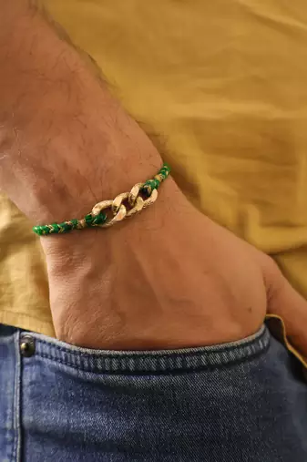 Golden chain green thread rakhi with roli chawal capsules