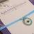 Blue evil eye protection rakhi with roli chawal capsules
