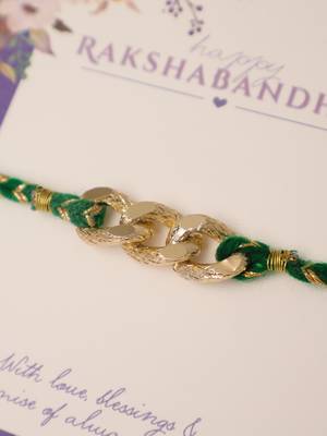 Golden chain green thread rakhi with roli chawal capsules 4