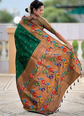 Green silk blend saree with peacock motif zari border 2
