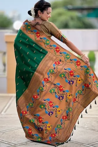 Green silk blend saree with peacock motif zari border