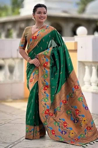 Green silk blend saree with peacock motif zari border