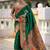 Green silk blend saree with peacock motif zari border