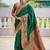 Green silk blend saree with peacock motif zari border