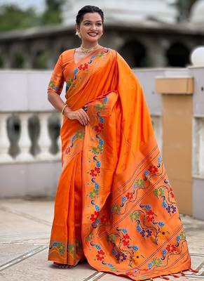 Orange silk blend saree with peacock motif zari border 3