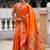 Orange silk blend saree with peacock motif zari border
