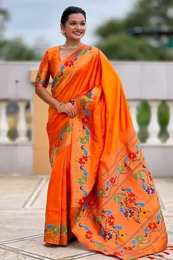 Orange silk blend saree with peacock motif zari border