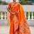 Orange silk blend saree with peacock motif zari border
