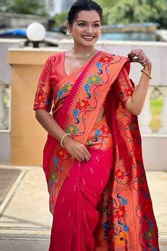 Ranipink silk blend saree with peacock motif zari border