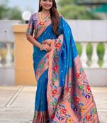Skyblue silk blend saree with peacock motif zari border