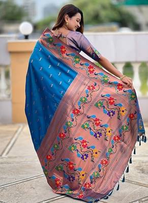 Skyblue silk blend saree with peacock motif zari border 2