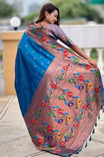 Skyblue silk blend saree with peacock motif zari border