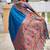 Skyblue silk blend saree with peacock motif zari border