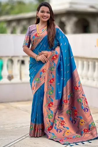 Skyblue silk blend saree with peacock motif zari border