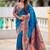 Skyblue silk blend saree with peacock motif zari border
