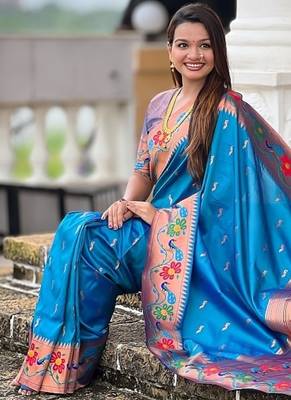 Skyblue silk blend saree with peacock motif zari border 4