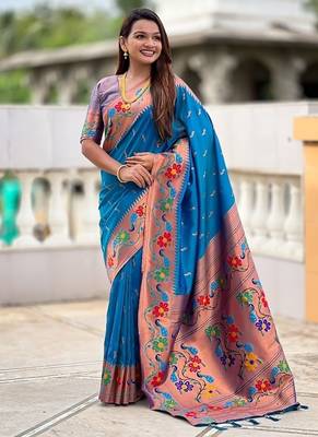 Skyblue silk blend saree with peacock motif zari border 5