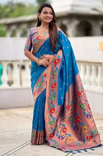 Skyblue silk blend saree with peacock motif zari border