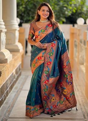 Teal silk blend saree with peacock motif zari border 1